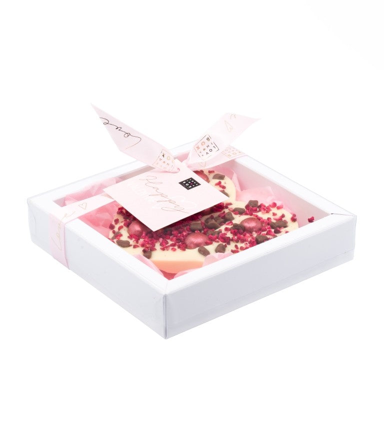 Wit chocoladehart in geschenkverpakking